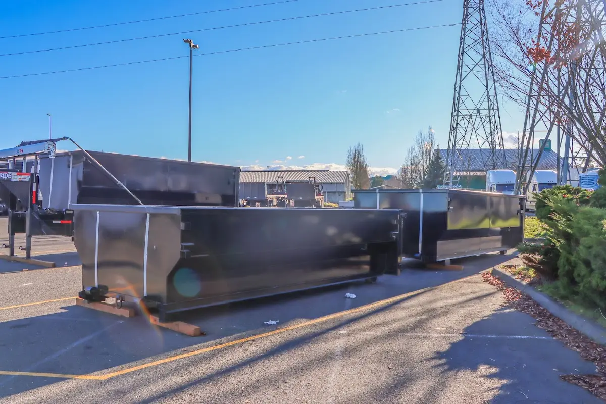 Roll-off dumpster ready for waste disposal at job site for Concrete Dumpster Rental in Floresville